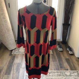 Light weight quarter sleeve patterned dress. Like new